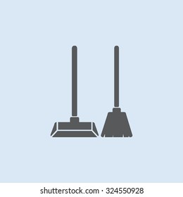 Dustpan and broom vector icon