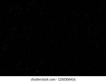 Dusty seamless texture, retro, vintage effect. White speck of dust on black background. 