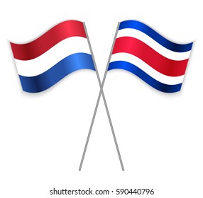 Dutch and Costa Rican crossed flags. Netherlands combined with Costa Rica isolated on white. Language learning, international business or travel concept.