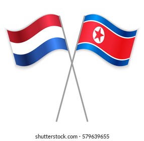 Dutch and North Korean crossed flags. Netherlands combined with North Korea isolated on white. Language learning, international business or travel concept.