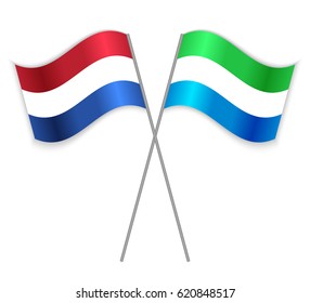 Dutch and Sierra Leonean crossed flags. Netherlands combined with Sierra Leone isolated on white. Language learning, international business or travel concept.