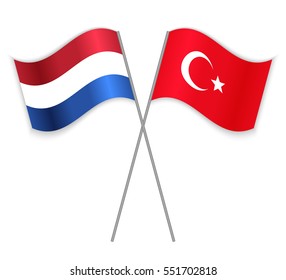 Dutch and Turkish crossed flags. Netherlands combined with Turkey isolated on white. Language learning, international business or travel concept.