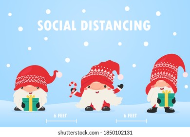 Dwarf gnomes wear masks and leave social space to prevent the corona during Christmas.