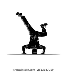 Dynamic silhouette of a b-boy executing a powerful freeze during street dance battle; ideal for athletic promotions and urban culture campaigns.
