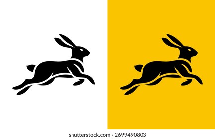 Dynamic silhouette of a black rabbit in mid leap against white and yellow backgrounds
