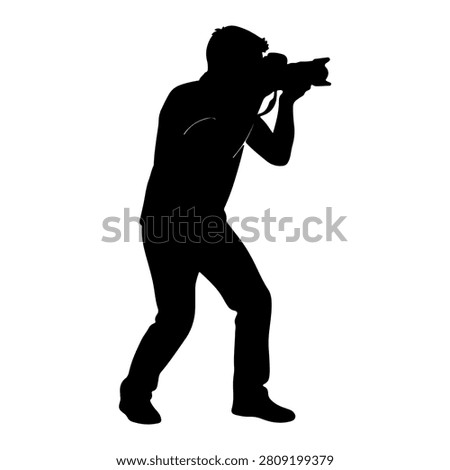 Dynamic silhouette of a person aiming a camera, capturing a shot, set against a plain white background, emphasizing focus and photography skills.