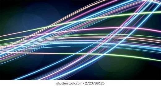 Dynamic streaks of neon light in blue, pink, and green create an abstract, energetic pattern against a dark backdrop.