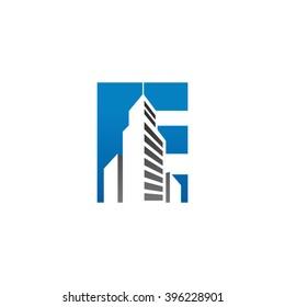 E alphabet building negative space letter logo blue