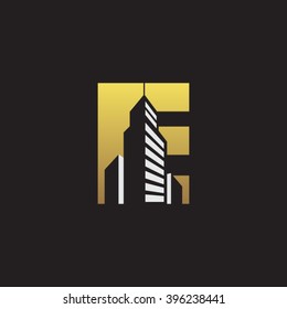 E alphabet building negative space letter logo gold black background