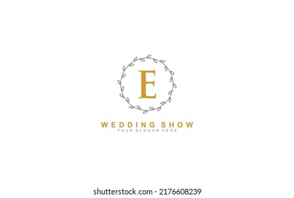 E beauty floral logo design inspiration. Vector letter wedding template design for brand.