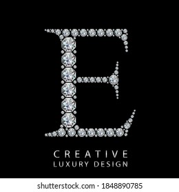 E diamond letter vector illustration. White gem symbol logo for your luxury business, casino, jewelry or web site. Upper letter with many sparkling diamonds isolated on black background.