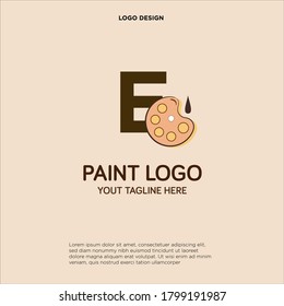 E diseño inicial de logotipo con pincel de pintura y paleta