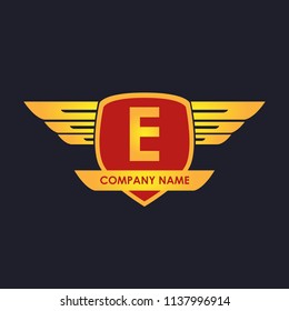E initial shield with wings gold color logo
