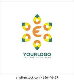 E letter colorful overlay logo with circle part shapes. 