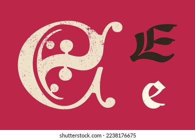 E letter drop cap logo. Illuminated initial and blackletter uppercase and lowercase. All you need to precisely imitate medieval text. Decorative element for the beginning of a paragraph or section.