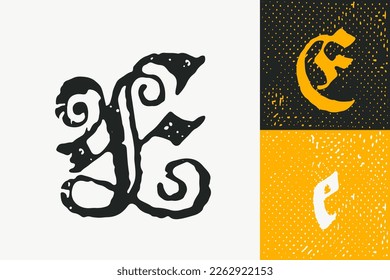 E letter drop cap logo. Illuminated initial and blackletter uppercase and lowercase. All you need to precisely imitate medieval text. Decorative element for the beginning of a paragraph or section.