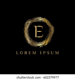 E letter golden nest vector logo design template