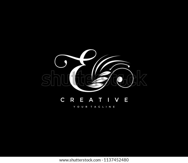 E letter luxury\
flourishes ornament logo
