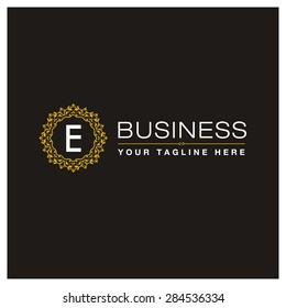 E letter Luxury Logo template flourishes calligraphic elegant ornament lines. Business sign, identity for Restaurant, Royalty, Cafe, Hotel, Heraldic, Jewelry, Fashion and other vector illustration