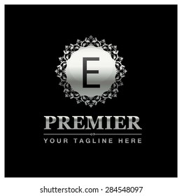 E letter Luxury Logo template flourishes calligraphic elegant ornament lines. Business sign, identity for Restaurant, Royalty, Cafe, Hotel, Heraldic, Jewelry, Premier and other vector illustration