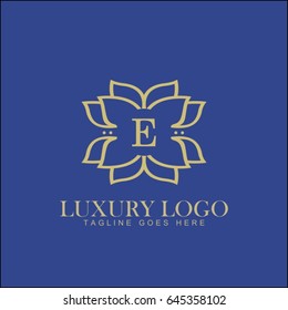 E letter. Luxury logo template flourishes calligraphic elegant ornament lines. Business sign, identity for Restaurant, Royalty, Boutique, Hotel, Jewelry, Fashion and other vector illustration