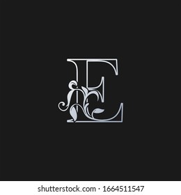 Letra E   Contorno al icono del logotipo de la hoja tropical de la naturaleza inicial. Diseño vectorial concepto de diseño monogramo vintage con logotipo color plata.