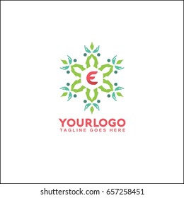 E letter trendy and elegant logo design. Vector floral shop or studio, wedding florist, custom. circle with flowers and leaves.