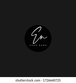  E N EN Initial letter handwriting and signature logo.	
