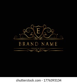 E logotipo de monograma de oro de lujo premium. Logo de la letra E. Logotipo de oro de lujo en monograma E.