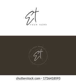  E T ET Initial letter handwriting and signature logo.	
