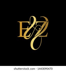 E & Z / EZ logo initial vector mark. Initial letter E & Z EZ luxury art vector mark logo, gold color on black background.