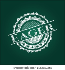 Eager chalk emblem written on a blackboard