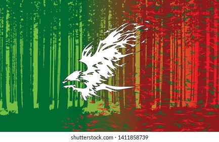 the eagle attacks against the background of a burning forest