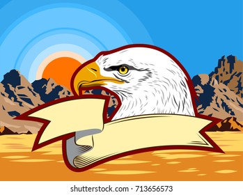 Eagle with banner in the desert against the background of mountains