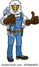 An eagle cartoon animal mascot carpenter or handyman builder construction maintenance contractor holding a hammer and giving a thumbs up