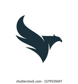 Eagle flapping its wings and flying. Abstract eagle icon.