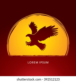 Eagle flying attack designed on moonlight background graphic vector.