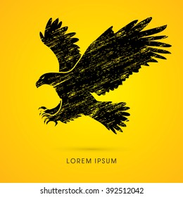 Eagle flying attack designed using grunge brush graphic vector.