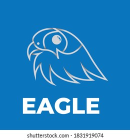eagle head glowing on isolated blue background


