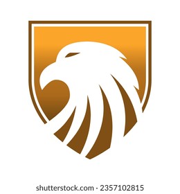 Eagle head with gold shield in emblem logo