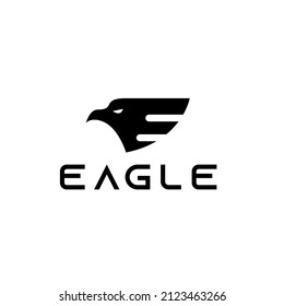 eagle head logo. Eagle or falcon head silhouette. Letter E logo.