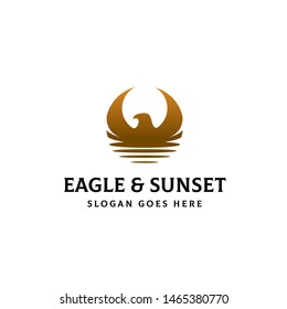 Eagle head and wings combined with sunset scene logo design