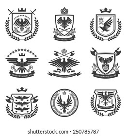 Eagle heraldry coat of arms emblems shield icons set with spread wings black isolated abstract vector illustration