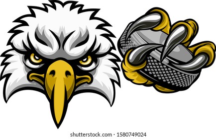 An eagle ice hockey player animal sports mascot holding a puck