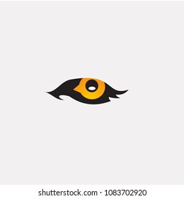 Eagle logo forming eyes that are staring sharply, white vector Background