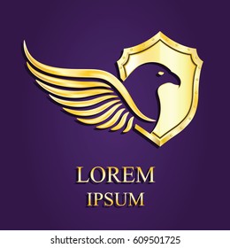 Eagle Logo Icon Design. Stock vector. Stylized eagle spreads its wings. Golden color on violet background.