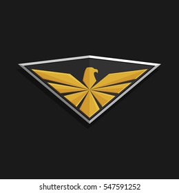 Eagle Logo Icon Design. Stylized eagle spreads its wings on a shield. Golden and silver color on a dark background. Stock vector emblem.
