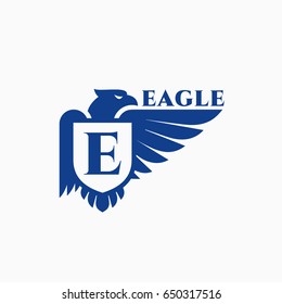 Eagle logo template design with a shield and a wing. Vector illustration.