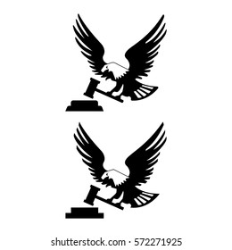 Eagle Logotype Bird With Hammer And Anvil Isolated On White Backgroundicon. Heraldic Emblem Of Powerful Wild Falcon With Stretching Clutches. Symbol Of Eagle Hawk Predator For Company Badge