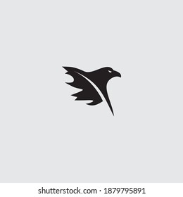 eagle with oak leaf wings, animal meet nature logo.